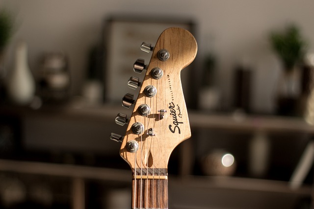 A close-up of the headstock of a guitar